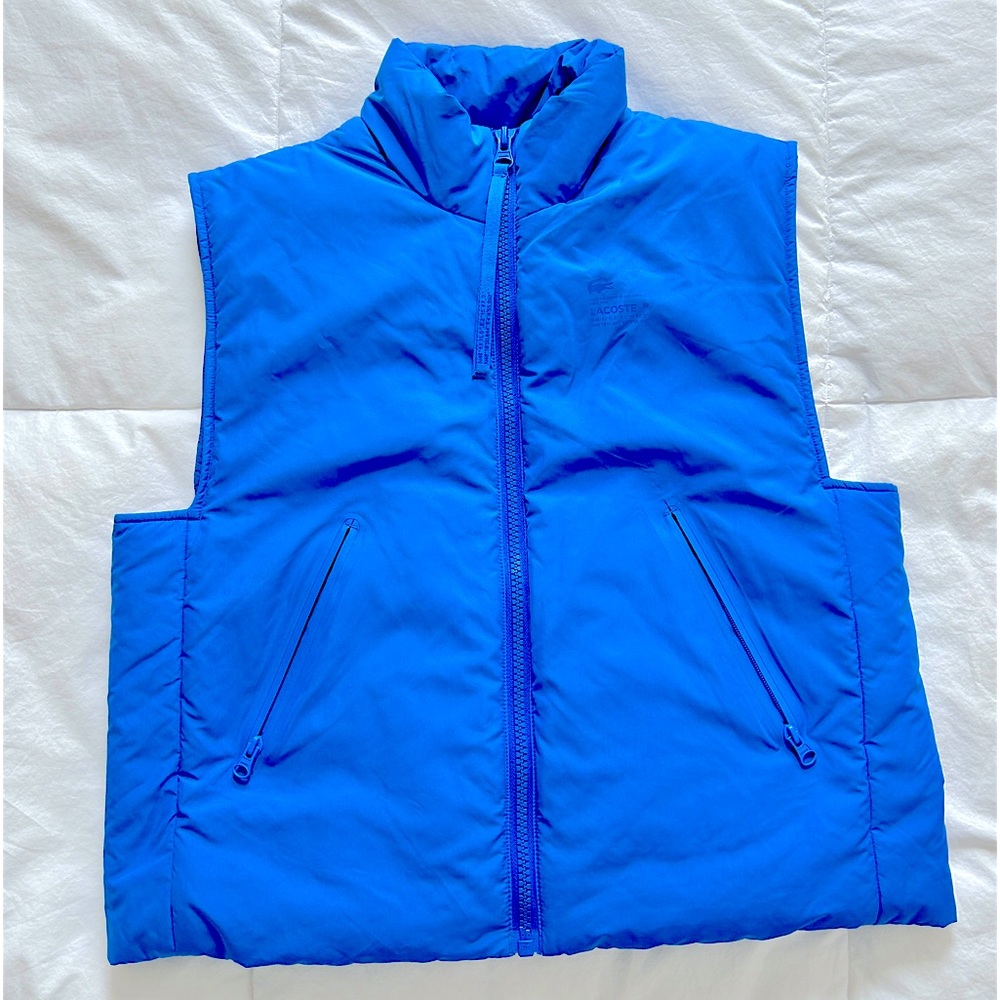 Lacoste sleeveless puffer vest in a soft bleu
